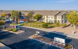 Crescent Ridge Apartment complex with a parking lot in front.