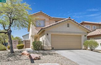 Stunning 3 bedroom home in gated Summerlin community with a pool.