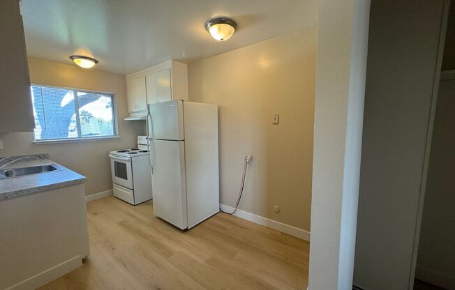 Upstairs 1 bedroom 1 bath apartment w/ assigned parking!