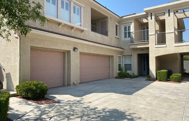 Summerlin!!! Gated!! Downstairs unit!! Tandem Attached two car garage and Drive way!! Balcony!! No Carpet!! Community Pool & Spa!!
