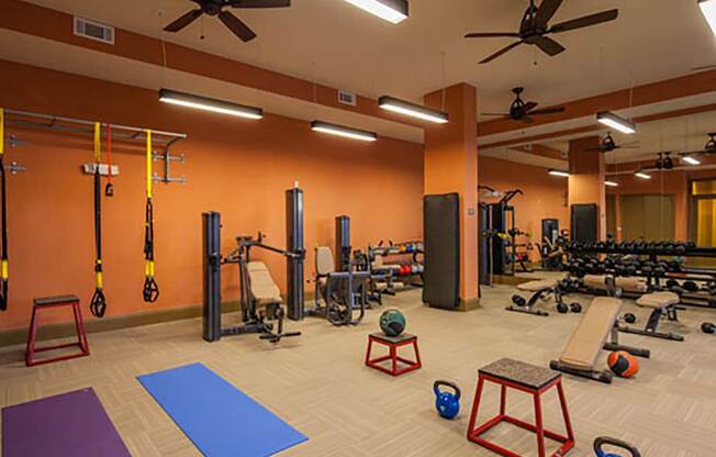 a workout room at the residences at omni louisville