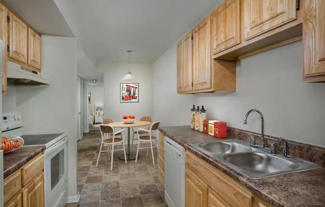 a kitchen with a sink and a table