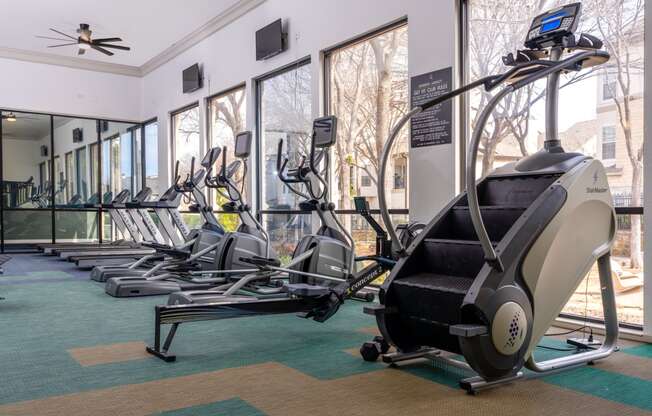 a gym with treadmills and ellipticals at the resort at governors crossing