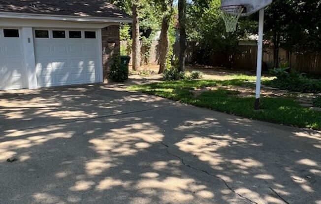Charming 3-Bedroom Home with Gorgeous Trees in Prime Hurst Location!