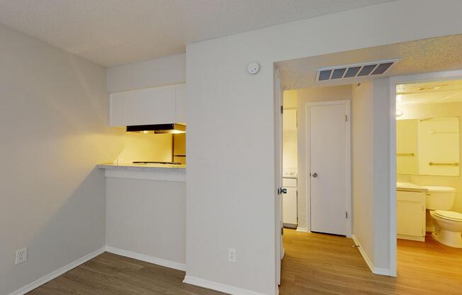 a kitchen with a stove and a refrigerator