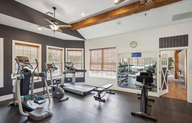 the gym with treadmills and weights at 1861 muleshoe road
