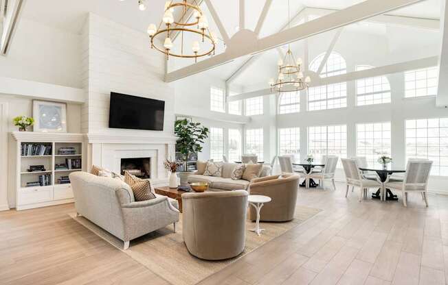 A living room with a fireplace and a television.