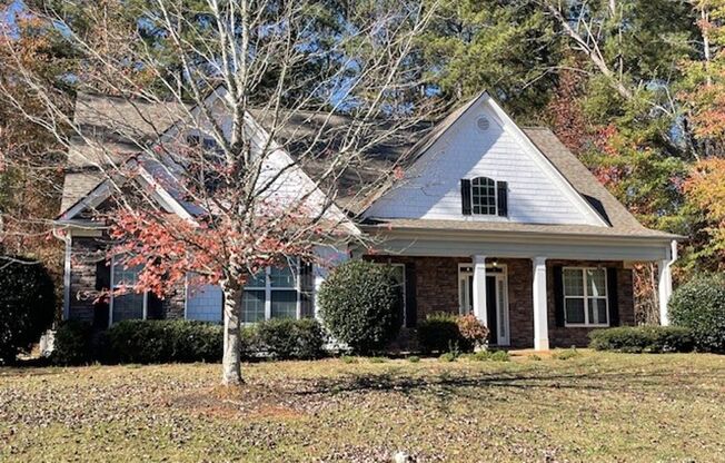 115 Rising Mist Dr: Spacious 5BR, 3BA home on beautifully landscaped lot. Master and Guest Room on Main w/ additional 3BR upstairs. Conventionality located minutes from Piedmont Fayette and Trilith Studios.