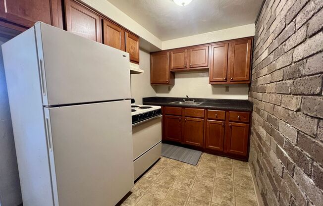 Amazing One Bedroom on the Second Floor! Built in A/C, Exposed Brick & More! Call Today!