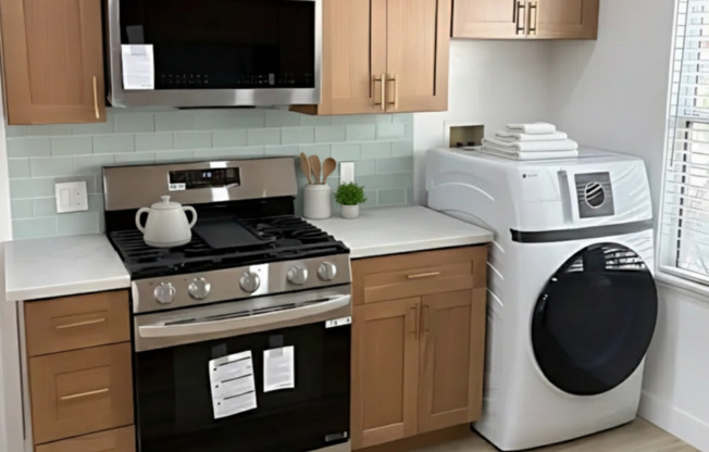 $1,000 Move-In Credit | Modern 2-Bed Oasis + Garage Available