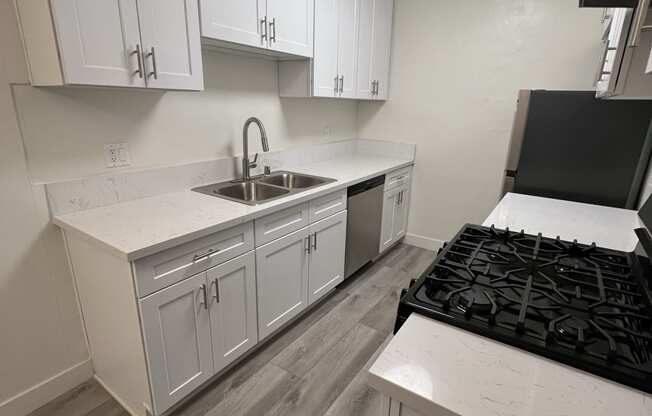 Kitchen with Stainless Steel Appliances and White Cabinets