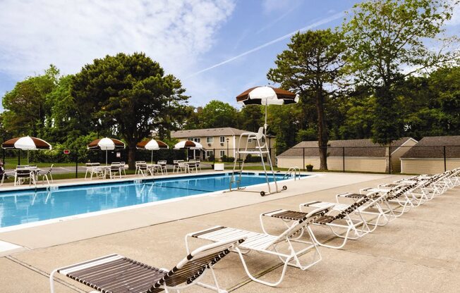 in ground pool and lounge chairs at Lakeside Village, East Patchogue