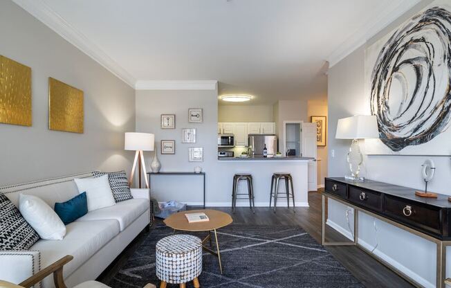 a living room with a couch and a table