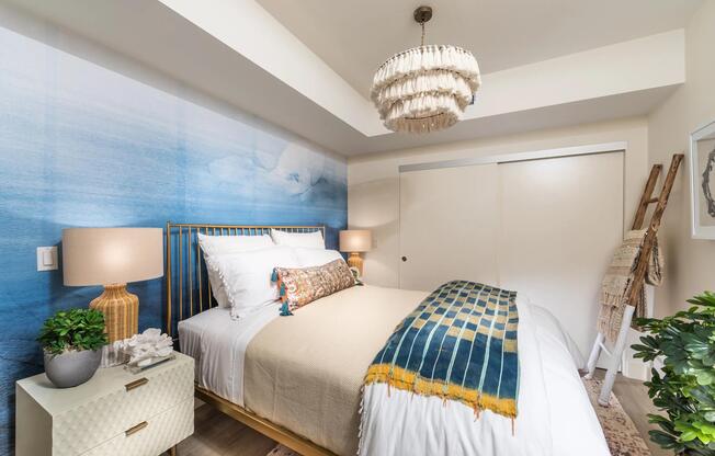 Primary bedroom featuring expansive closet space and spa‑inspired bathroom access.