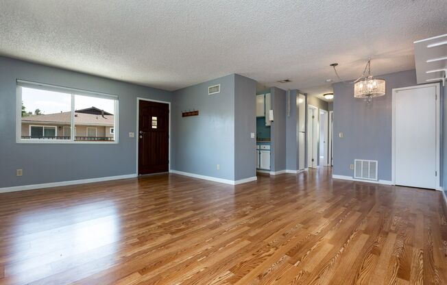 Adorable Upper Unit Condo with 1 Car Garage!