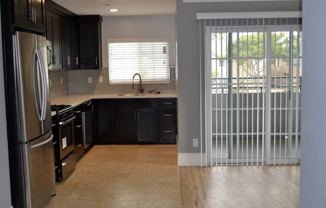 Gorgeous 2/2 with Assigned Parking! In Unit Washer & Dryer! Gated Community! Centrally Located!