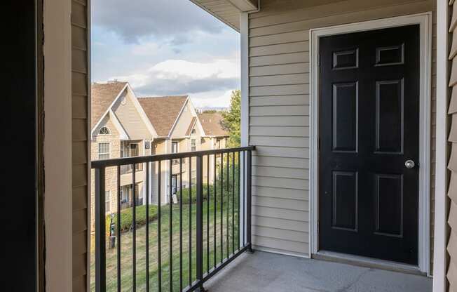 the view from the balcony with a black door