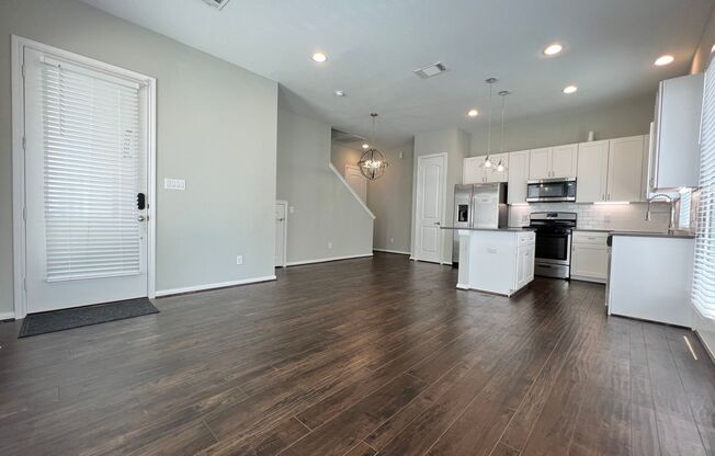 Introducing a stunning and impeccably maintained townhome that radiates the allure of modern luxury and comfort!