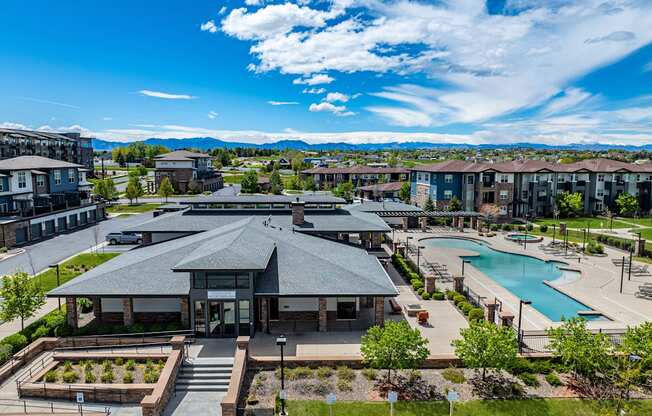 an aerial view of a community with a pool and buildings at Arbour Commons, Colorado, 80023