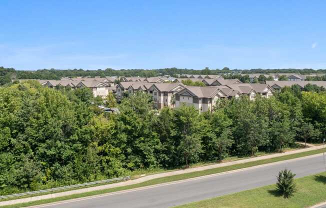 a row of houses on the side of a road