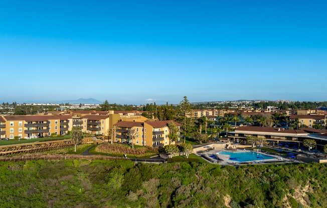 an aerial view of the resort with a swimming pool