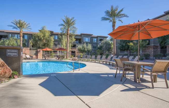 Pool Side Relaxing Area With Sundeck at The Passage Apartments by Picerne, Henderson, NV, 89014