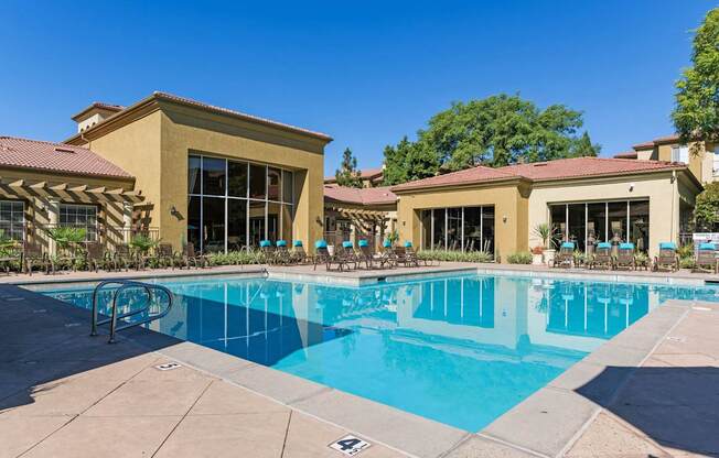 A large swimming pool Legacy Apartments