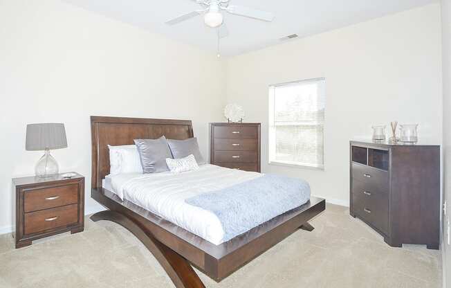 Carpeted Bedroom with Ceiling Fan and Light