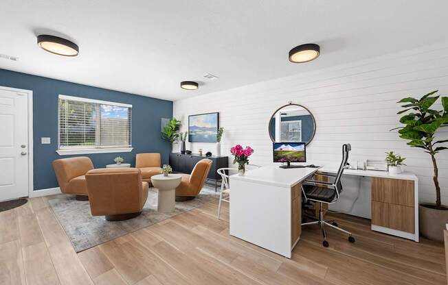 A room with a white desk and a brown chair.
