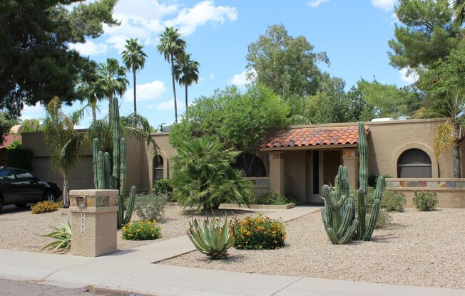 GORGEOUS 3 BEDROOM, 2 BATHROOM HOME WITH PEBBLE TECH POOL IN COVETED SCOTTSDALE LOCATION!