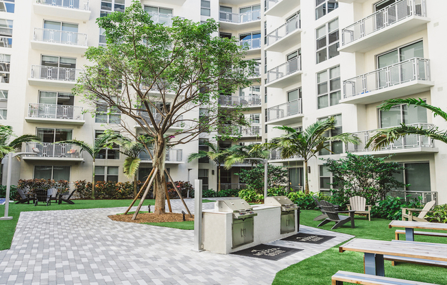 Courtyard with grilling stations and dining areas