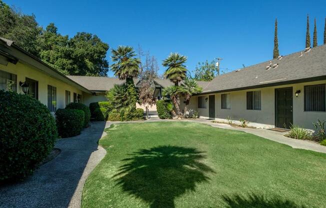 Lush Green Outdoors at Reef Apartments, Fresno