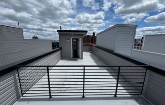 New Construction 3-Bedroom Townhome with Finished Basement and Roof Deck! Available NOW!