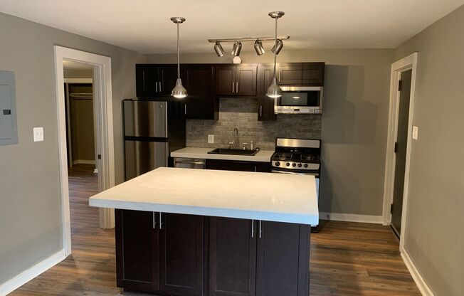 315-321 1/2 Denniston