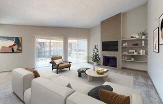 A living room with a white couch and a television.