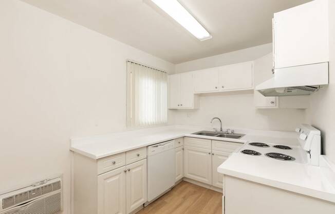 Kitchen with White Appliances and White Cabinets