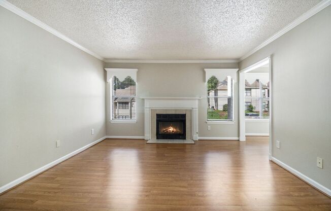 Sunlit 2BD/2BA with Fireplace in Peaceful Perimeter Community
