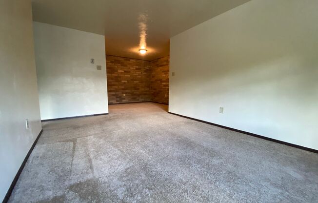 Amazing One Bedroom on the Second Floor! Built in A/C, Exposed Brick & More! Call Today!