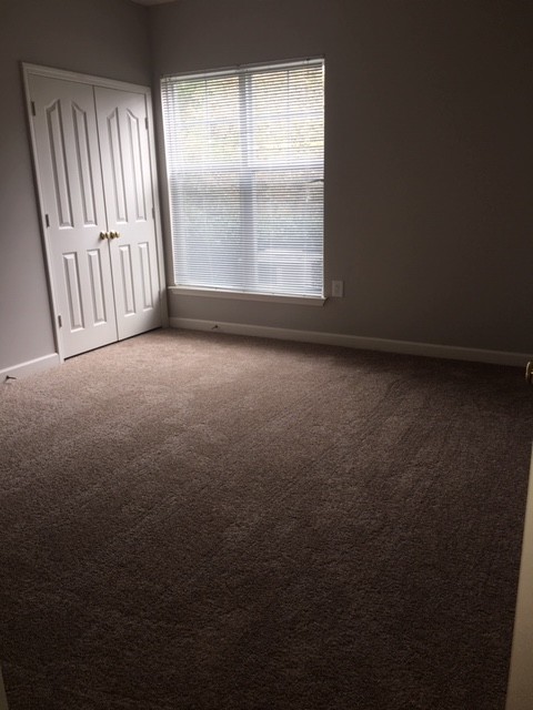 First Floor Condo in Cornelius-2 Bedrooms + Additional Flex Space with Door