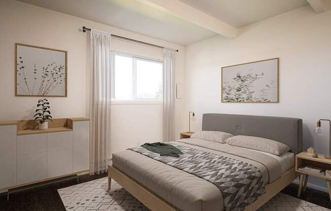 A bedroom with a large bed and a window with curtains.