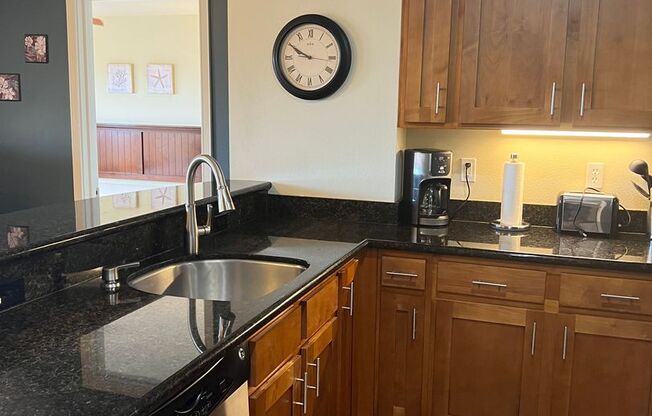 Top-Floor Ocean View Condo Across from the Beach | Furnished 2BR + Central A/C