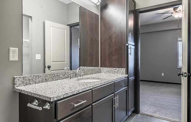 Interiors- Granite countertops vanity in Bathroom at the Villas of Omaha at Butler Ridge in Omaha Nebraska