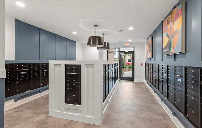 A hallway with a white door and a grey floor.