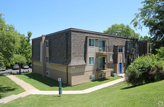 Thumbnail 1 of 50 - Exterior view of apartment building at Stone Oak Apartments in Independence, Missouri