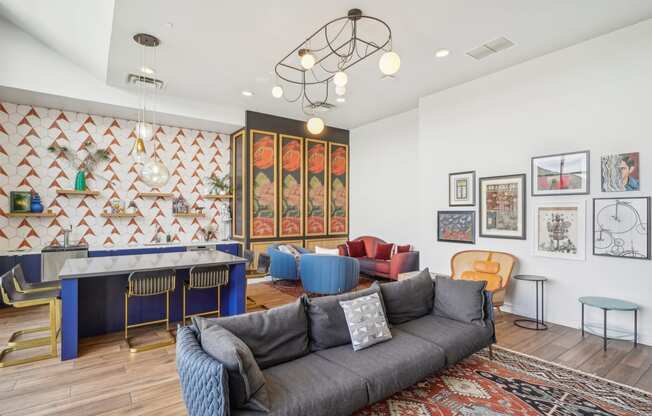 a living room with a couch and a pool table