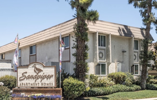 the front of the sandpiper apartment homes building
