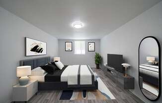 A modern bedroom with a large bed and a flat screen TV.