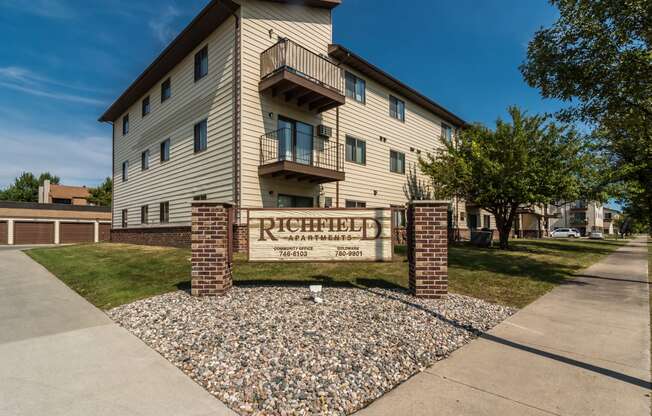 an apartment building with a sign  at Harrison and Richfield, Grand Forks, ND