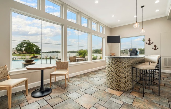 A sunny day at the lake from a house with a bar.