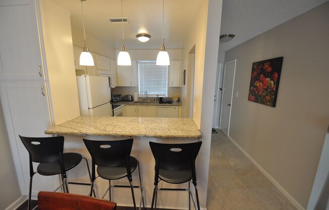 Charming 2-Bedroom Condo in Scenic Winter Park’s Mead Gardens Community